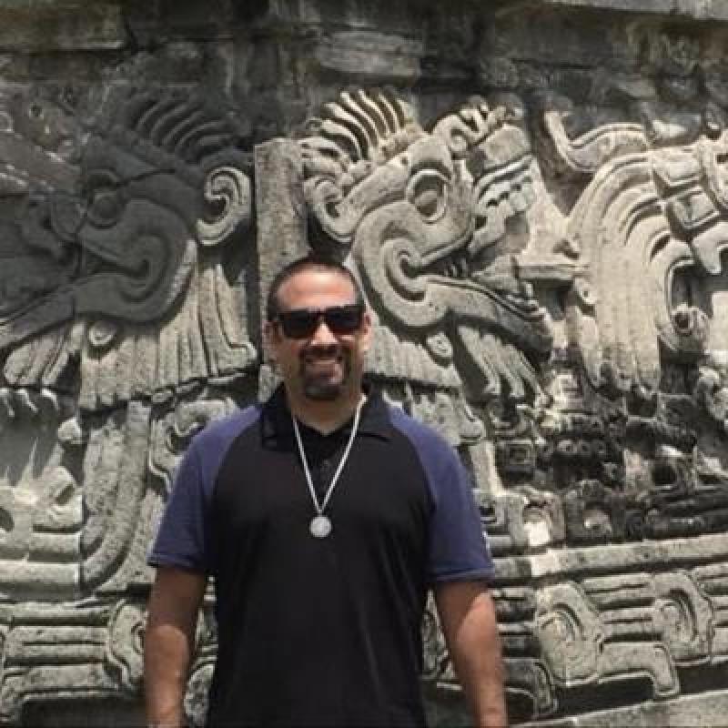 James Mestaz in front of a monument 